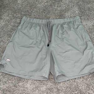 Men’s Fabletics shorts in silver